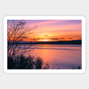 Frozen Scottish lake at sunset on a winter afternoon Sticker